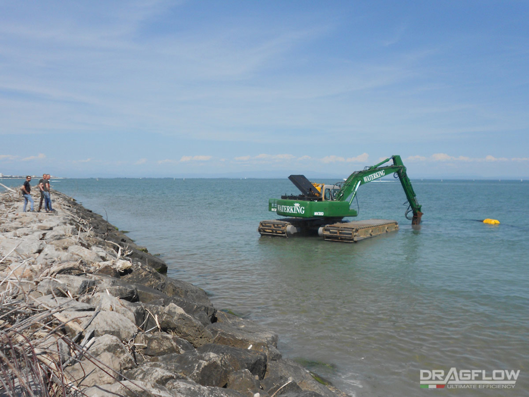 Dragado de arena del fondo marino